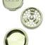 Green GRAV 2.75″ aluminum 3-piece grinder components displayed—toothed plate and roomy catch chamber.