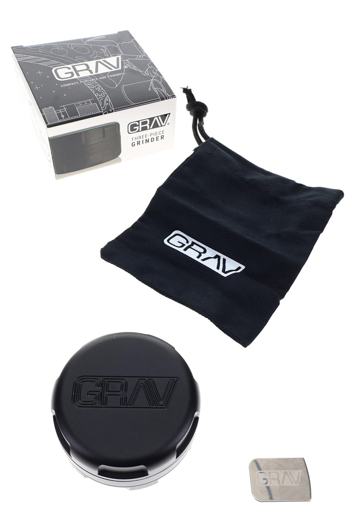GRAV 2.75″ three-piece metal herb grinder with retail box, soft travel pouch, and included scraper tool laid out.