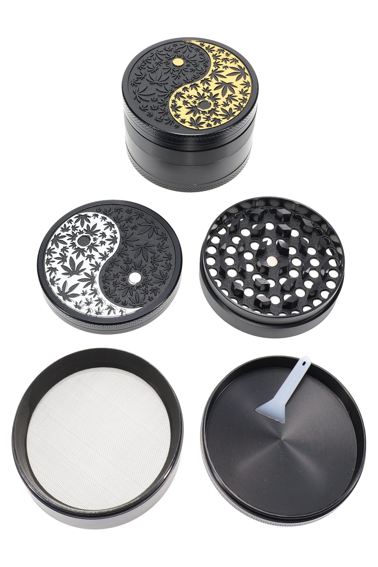 2.25-inch black 4-part metal herb grinder with embossed Yin Yang leaf lid, sifting screen and kief scraper shown in pieces