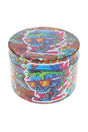 Colorful skull decal metal herb grinder with wraparound graffiti artwork and textured grip edge