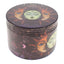 Celestial sun and moon decal metal herb grinder with dark wraparound artwork and grip texture