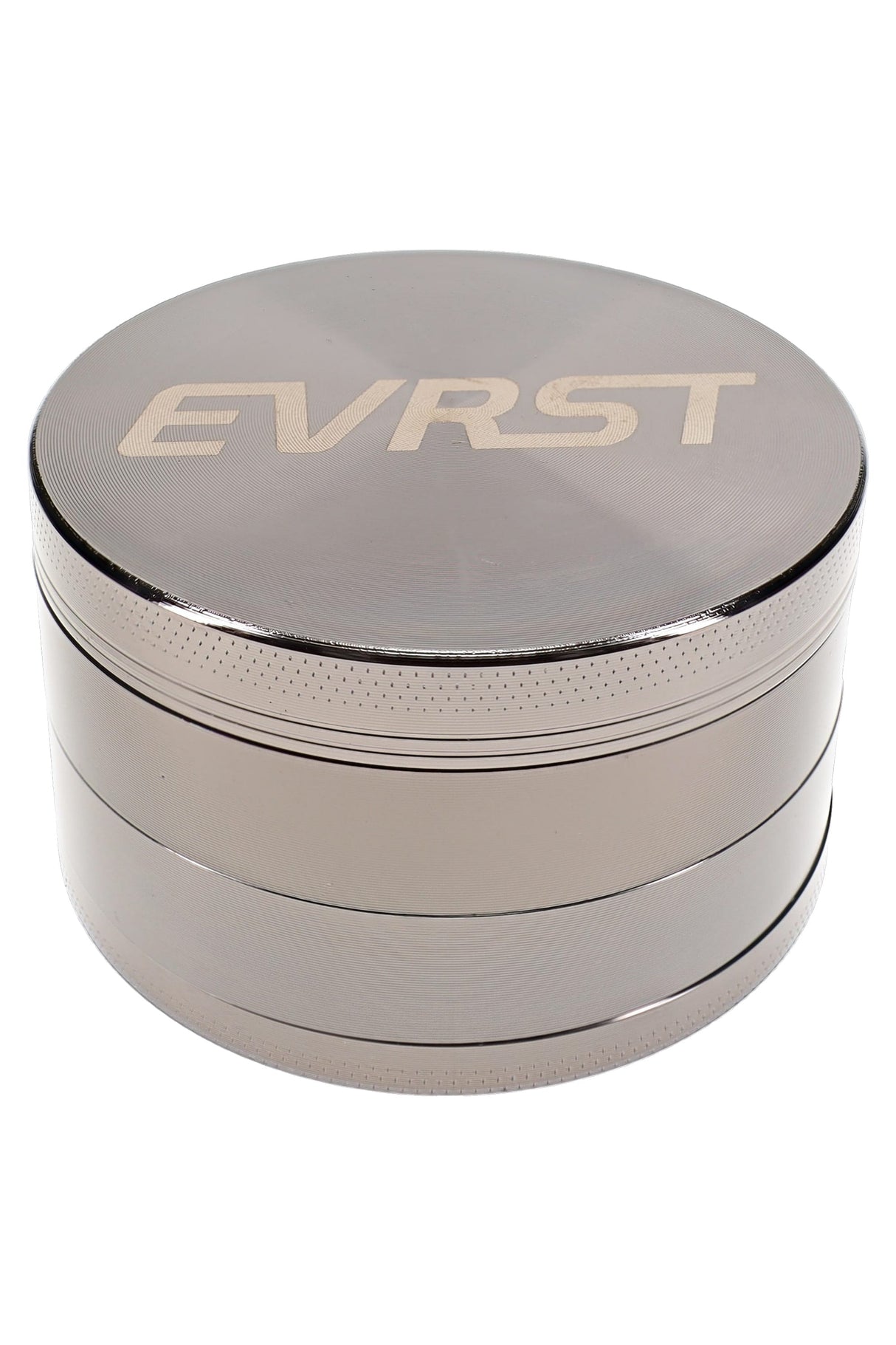 Polished silver EVRST herb grinder with engraved lid, stacked 4-part body, and grip texture