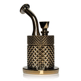 Gold Jane West glass water pipe front view with metallic finish, wide mouthpiece, and sturdy base