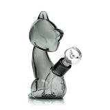 Compact smoky gray Hemper Alley Cats cat bong with rounded bowl joint and simple closed-eye face graphics, shown from side profile on white.
