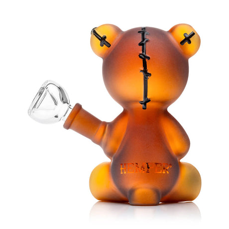 Rear view of Hemper Scare Bears teddy bear bong with stitched spine and frosted amber finish, clear downstem bowl joint visible.