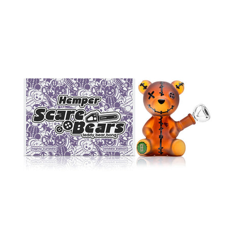 Front hero shot of Hemper Scare Bears amber teddy bear bong beside patterned retail box, compact novelty water pipe for collectors.