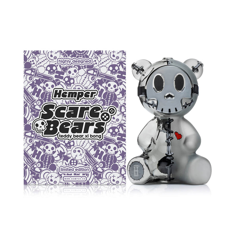 Front hero shot of Hemper 7-inch Scare Bears Teddy Bear XL bong next to patterned retail box, designer-style glass centerpiece for smokers.