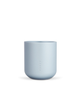 Light blue Puffco Proxy Core cup close-up with rounded anodized aluminum body and clean finish