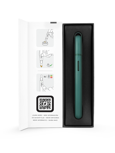 Pine Puffco Hot Knife displayed in open retail box with illustrated quick-start guide and tray