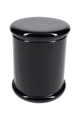 Sleek black large glass jar with glossy opaque coating and flat lid, isolated on white background for minimalist aesthetic
