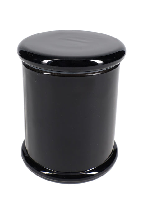 Sleek black large glass jar with glossy opaque coating and flat lid, isolated on white background for minimalist aesthetic