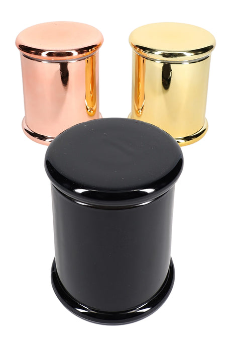 Trio of large colored glass jars—black foreground with copper and gold behind—each 4-inch tall with matching flat lids on white background