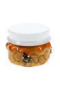 Amber honeycomb glass terp jar with white screw-top lid, bee accents, and compact 1½″ storage shape