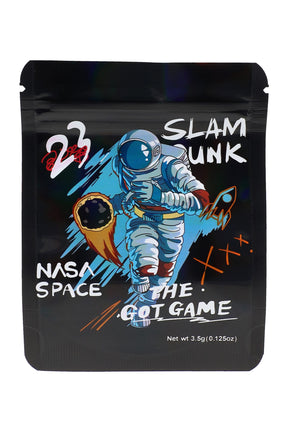 3.5 g mylar bag with astronaut slam-dunk art on black; compact ⅛ oz storage pouch in the “Slam Dunk” design.