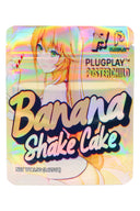 Banana Shake Cake 3.5 g mylar bag with anime-style character and bold logo on holographic foil background.