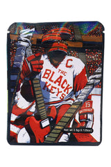 Stadium-scene ⅛ oz pouch with hockey gear and guitars reading “The Black Keys”; 3.5 g storage bag in band-style art.