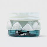 Rear view of Empire Glassworks arctic terp jar with sculpted orca detail and frosty glass band