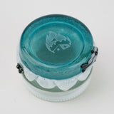 Bottom view of Empire Glassworks blue terp jar showing compact round base and handmade glass detail
