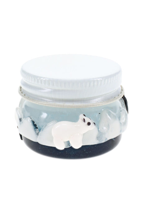 Empire Glassworks arctic terp jar front view with blue glass base and sculpted polar bear detail