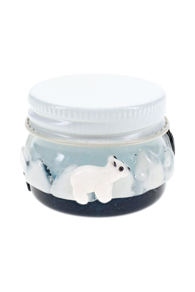 Empire Glassworks arctic terp jar front view with blue glass base and sculpted polar bear detail