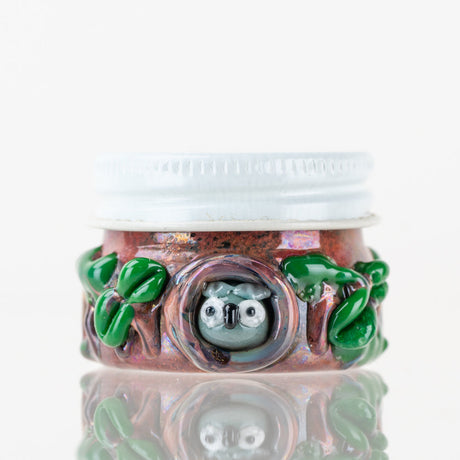 Empire Glassworks Hootie’s Forest terp jar front view with owl face and leafy glass detail