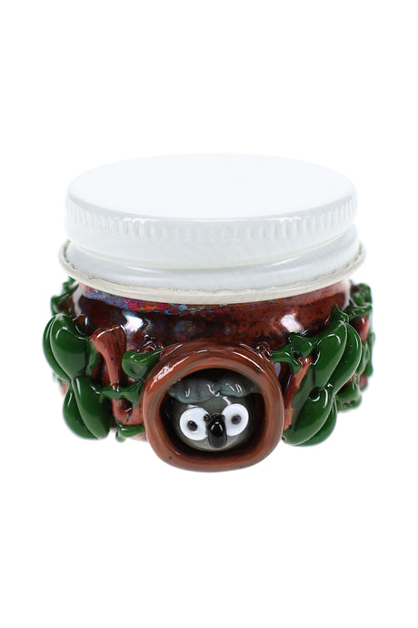 Empire Glassworks Hootie’s Forest terp jar front view with owl face and leafy glass detail