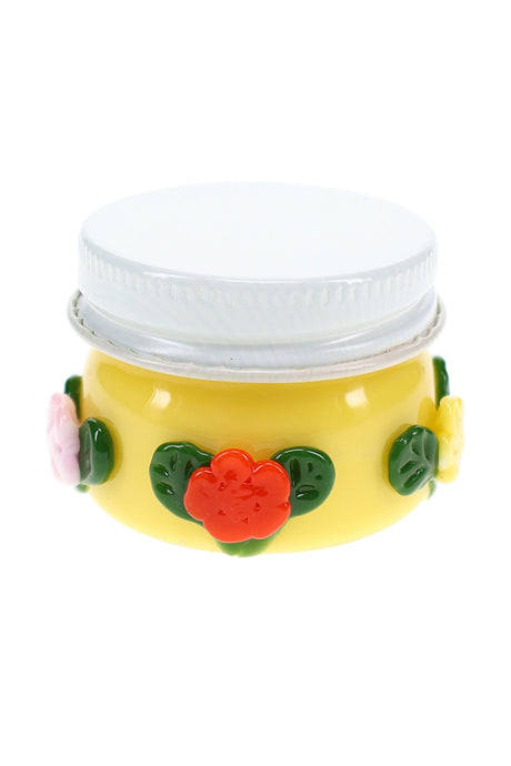 Empire Glassworks Sunshine Garden terp jar with yellow glass body, white lid, and raised flowers