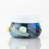 Empire Glassworks Across the Universe terp jar with astronaut, stars, and galaxy glass accents
