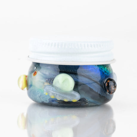Empire Glassworks Across the Universe terp jar with astronaut, stars, and galaxy glass accents