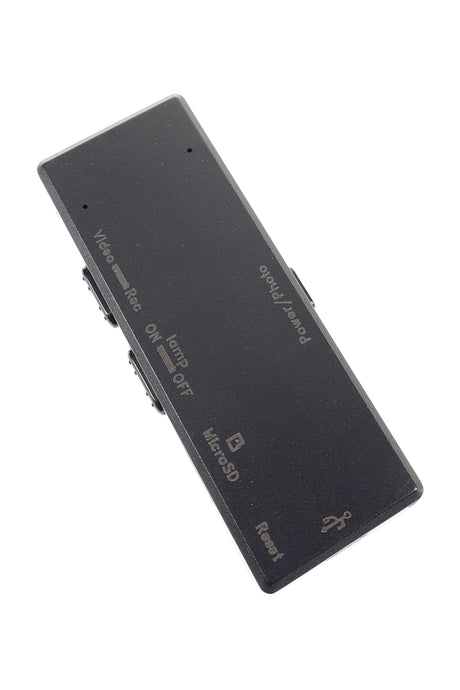 Flat-lay of slim voice recorder camera displaying labeled buttons and micro SD slot on white background