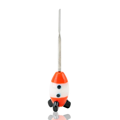 Front view of 5-inch space-cruiser glass dabber on white backdrop highlighting stainless spatula scoop and balanced rocket body with two blue portholes.