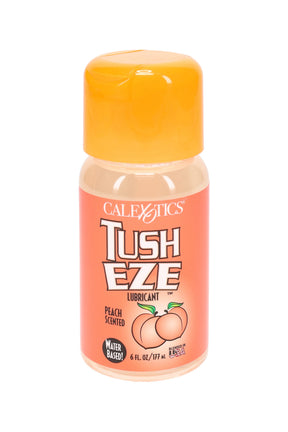 Tush Eze peach-scented water-based personal lubricant, 6-oz bottle with orange cap and label, clear formula product photo.