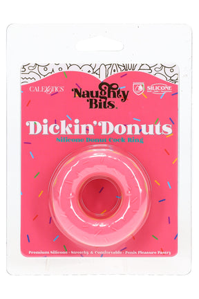 Pink silicone donut cock ring on sprinkle card; stretchy, seamless one-piece design for playful bedroom fun.
