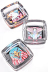 Square glass ashtray trio featuring patriotic eagle graphics in flame, military crest, and neon feather styles.
