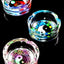 Three yin-yang themed 3.25-inch tempered glass ashtrays in bright mandala and cosmic hues, top-down view.