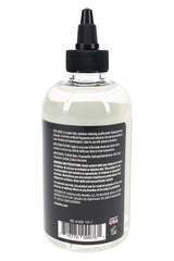 Back of Fuck Sauce 8 oz lubricant bottle showing directions, ingredients panel, and UPC barcode