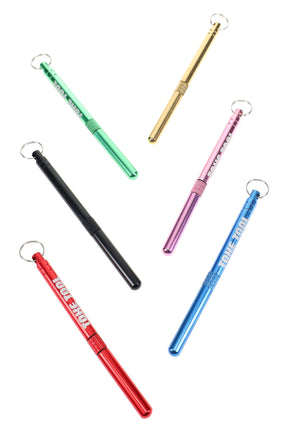 Assorted Stoned Earth Toke Tools shown closed, anodized metal keychain tubes with knurled grips for a pocket-ready scoop and poker.