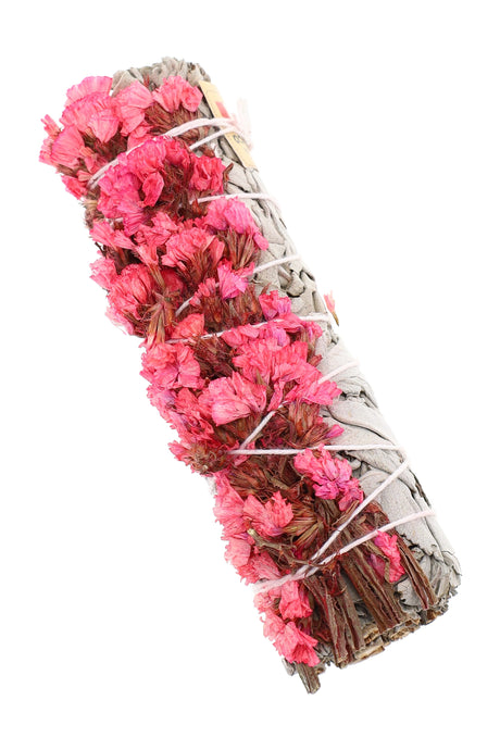 Pink flower-wrapped white sage smudge bundle; compact 4″ stick tied with string for home aroma rituals.