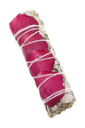 White sage smudge bundle wrapped in deep magenta rose petals; 4″ aromatic stick tied with cotton string.