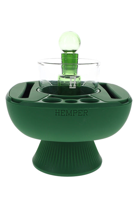 Forest green Hemper IsoPlex concentrate and cleaning station showing glass ISO cup, green carb cap and tool slots on silicone body.