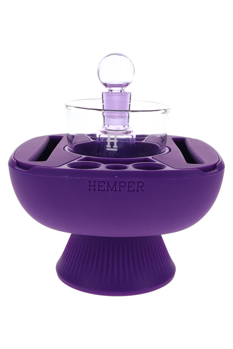 Purple Hemper IsoPlex concentrate station with matching carb cap and glass reservoir sitting on flared pedestal silicone base.