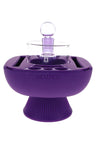Purple Hemper IsoPlex concentrate station with matching carb cap and glass reservoir sitting on flared pedestal silicone base.