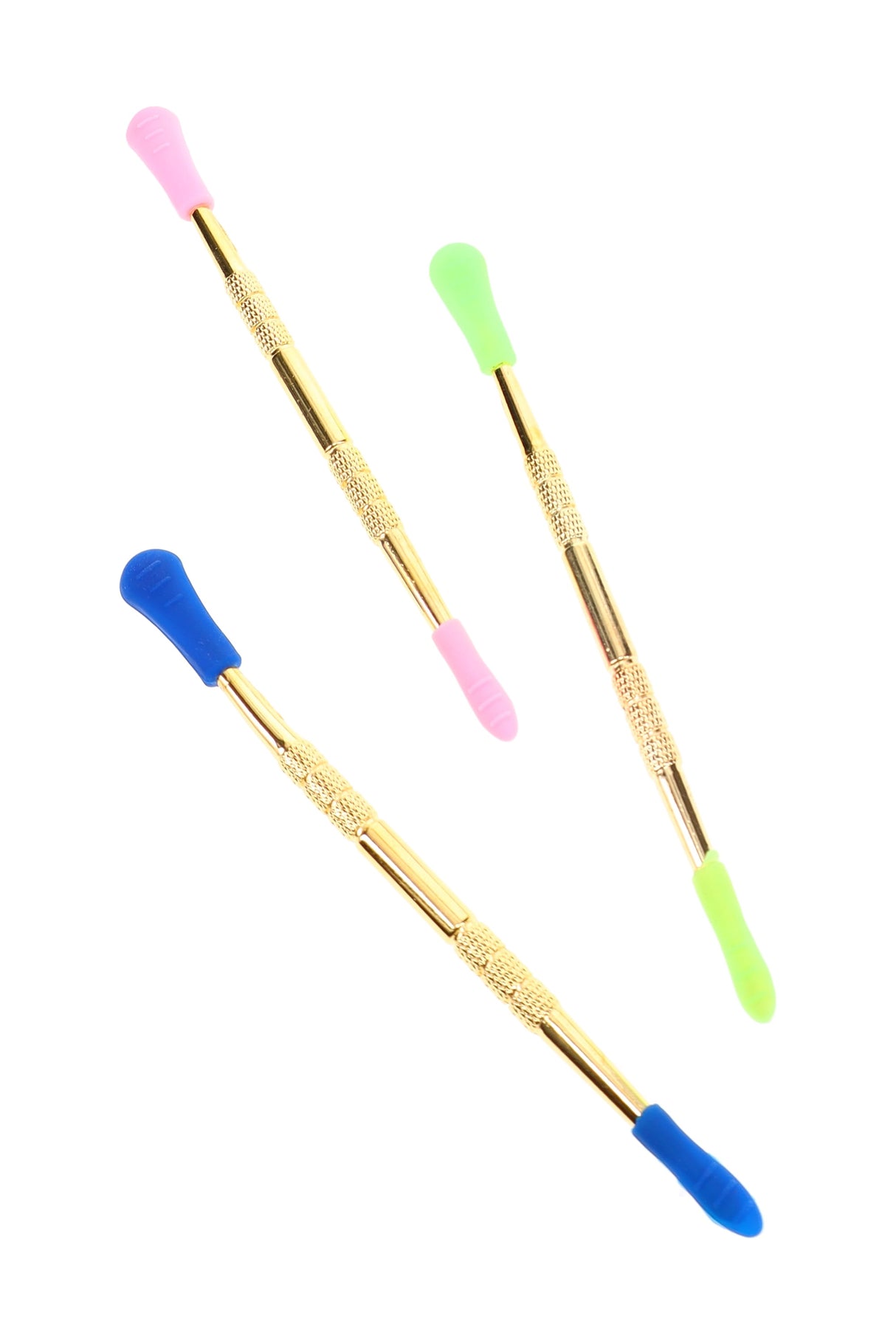 Three gold metal dab tools with blue, pink, and green silicone tips beside a 4½ inch ruler