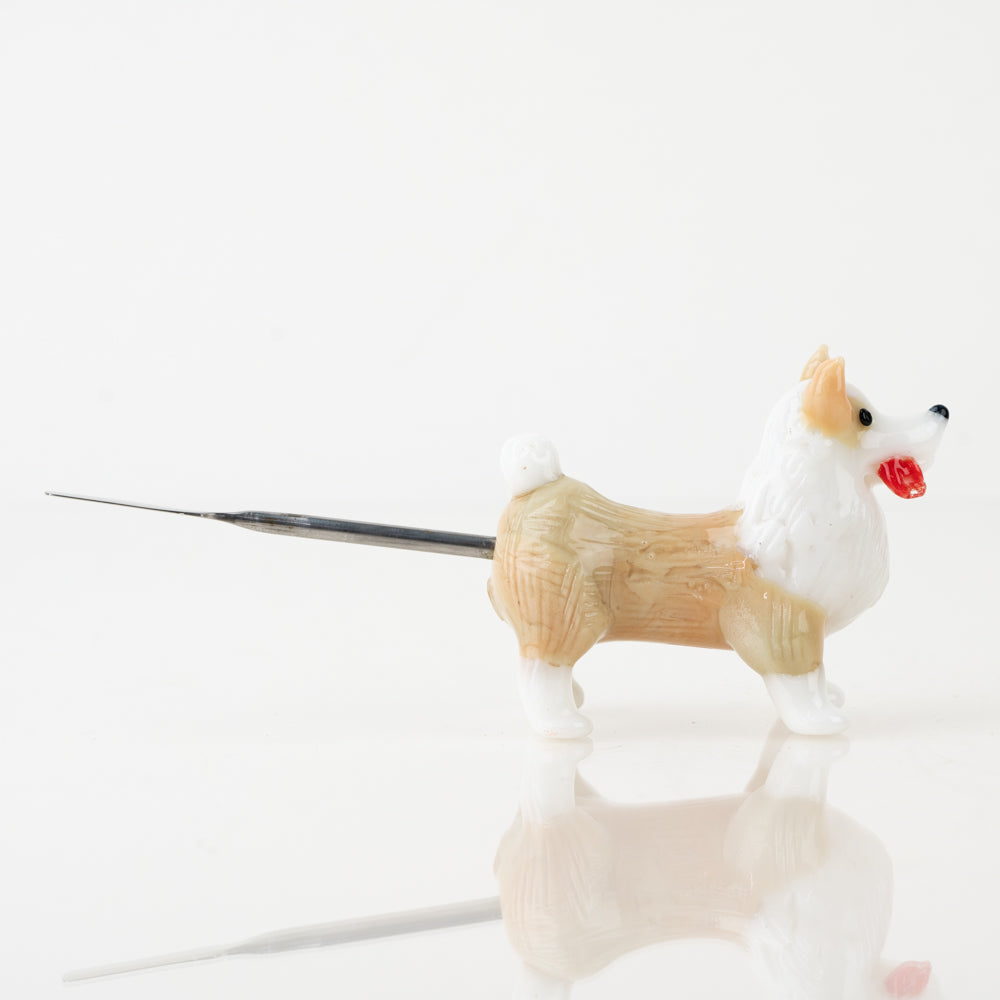Empire Glassworks Corgi dabber front view with tan and white glass detail and pointed ears