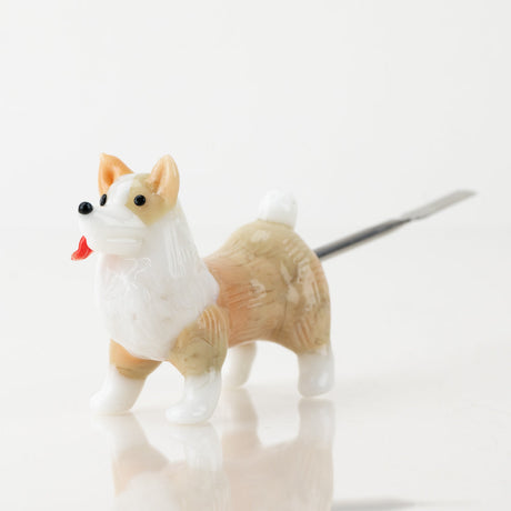 Empire Glassworks Corgi glass dab tool angled view showing sculpted dog body and tool tip