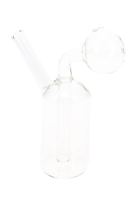 Small clear glass oil burner rig with straight mouthpiece, round globe top, and compact bottle-shaped base on white background