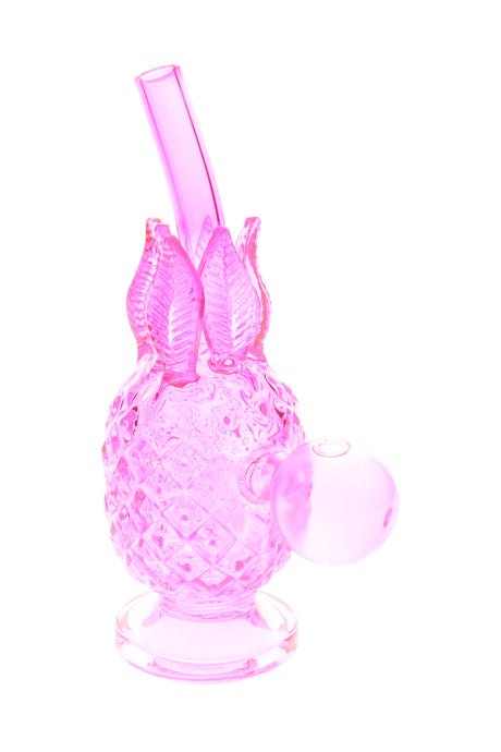 Light pink glass pineapple oil burner rig, textured body and leafy crown, compact 5.5″ size with globe head.