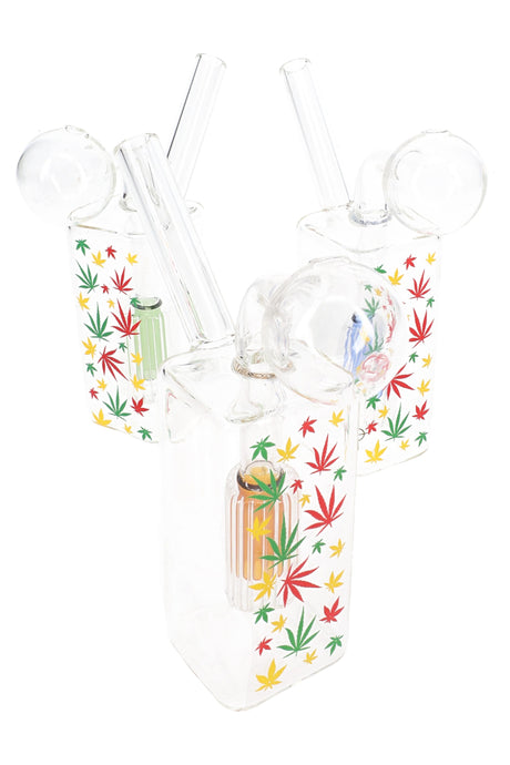 Assorted clear glass oil burner rigs with rasta leaf decals and colorful dome percs, compact 3.5″ size.