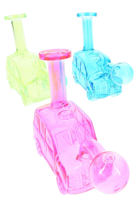 Assorted colorful glass car oil burner rigs in pink, blue, and green, compact 5-inch novelty glass pieces sold individually