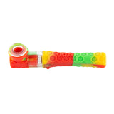 Rasta Ooze Piper silicone and glass hand pipe with red, yellow, and green hex-pattern body